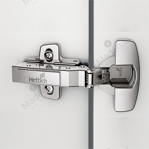 Bisagra Cazoleta Sensys Superacodada con Freno C/T Expan.52 en Plata. HETTICH